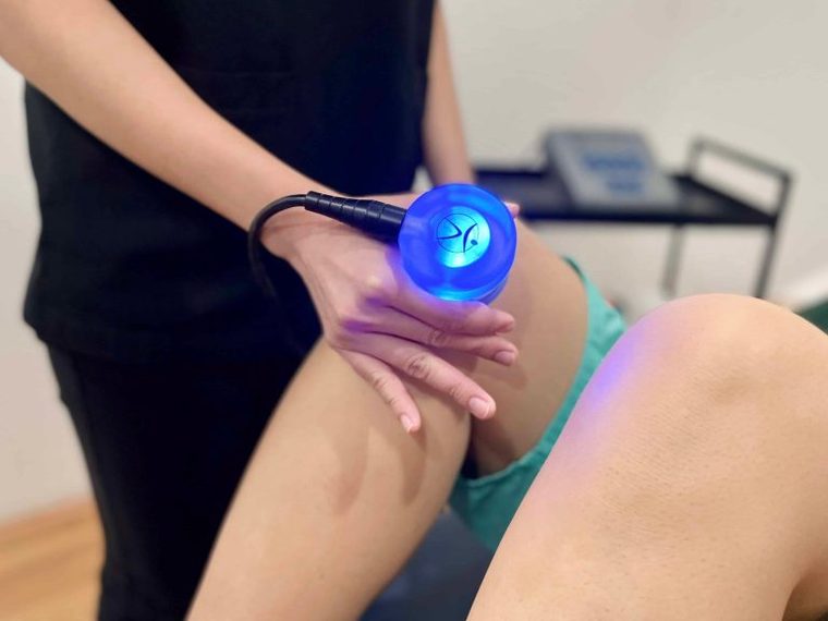 Therapeutic ultrasound being applied to a patient