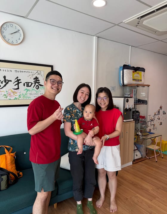 A Welo chiropractor with parents and their baby